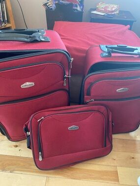 The Cambridge Satchel Company Red Travel Luggage with Black Trim